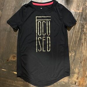 All in Motion Black Tee with Gold Focused Print